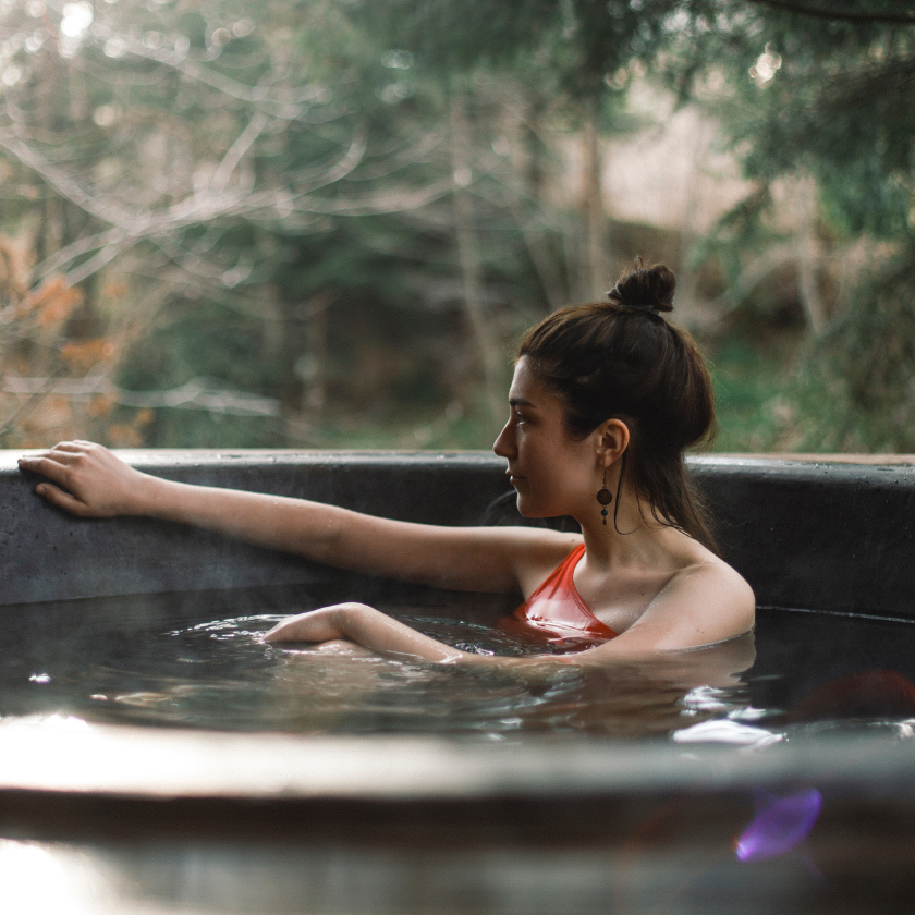 woman in hot tub on boutique holiday